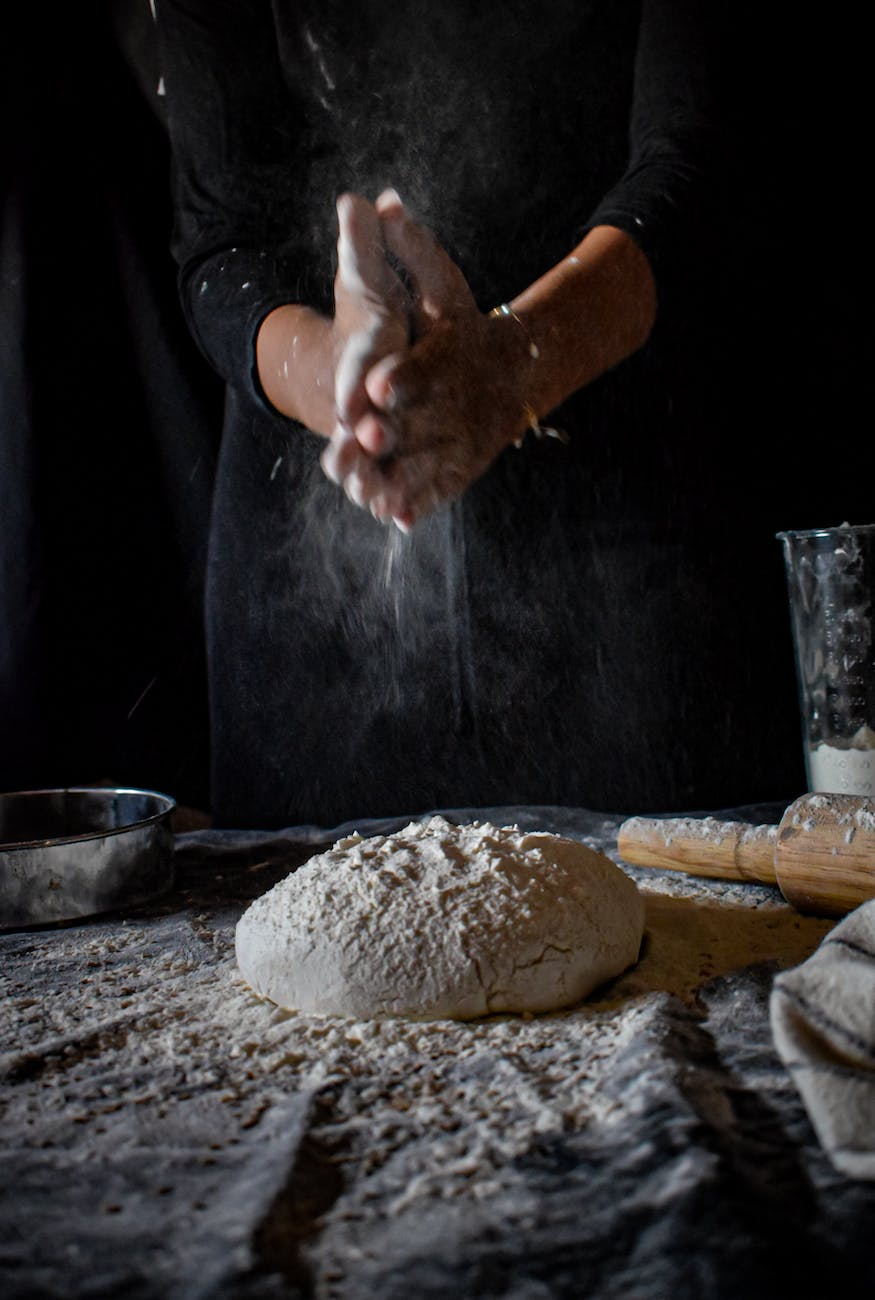 person making bread