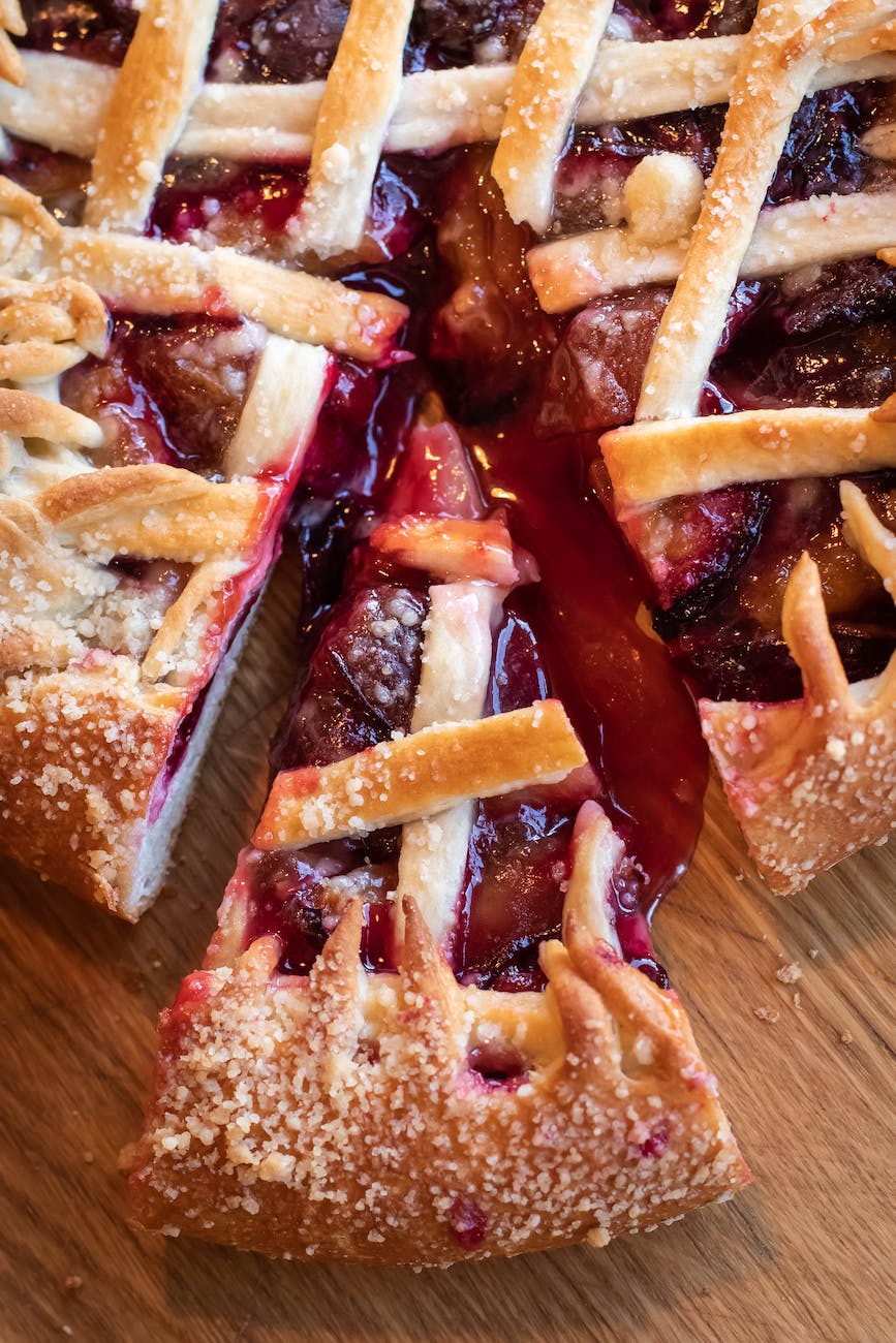 sliced apple pie on brown surface